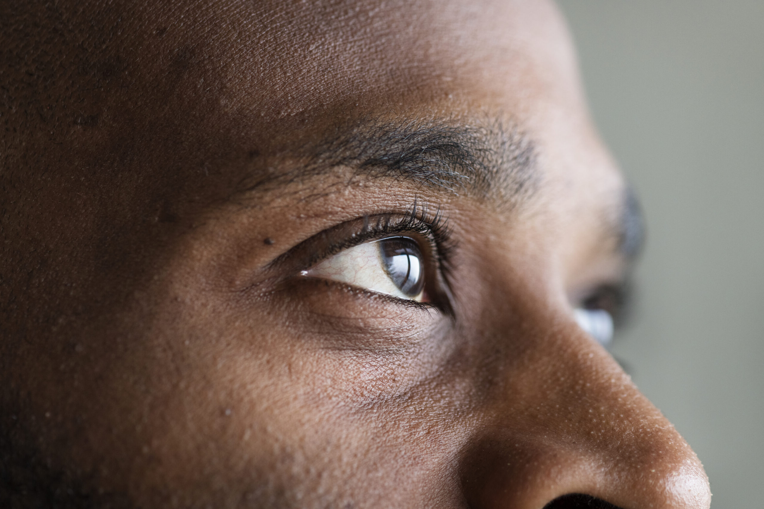 closeup of an eye of a black man